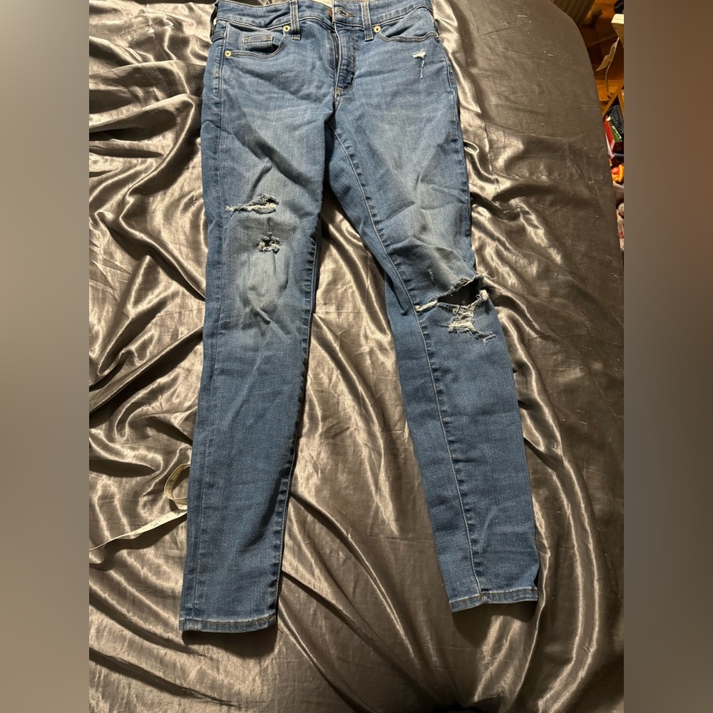 Size 2 universal threads, blue ripped jeans